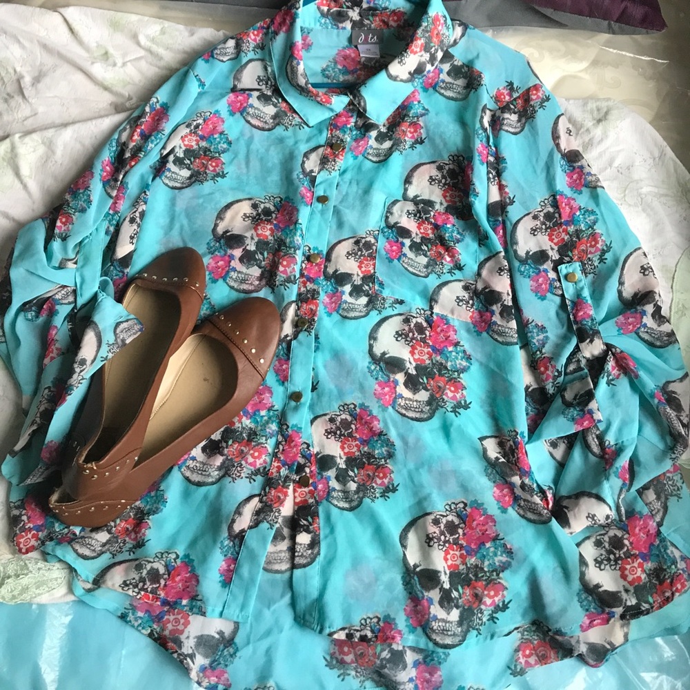 Light blue with long sleeves.