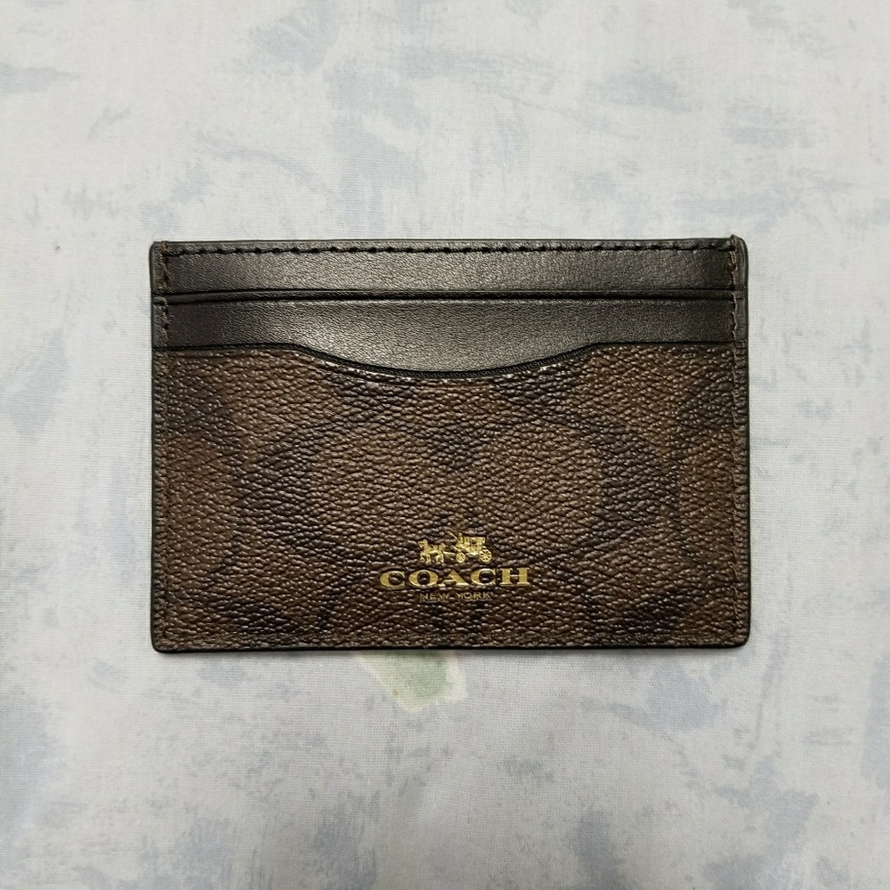 NWT Coach card case in brown signature.