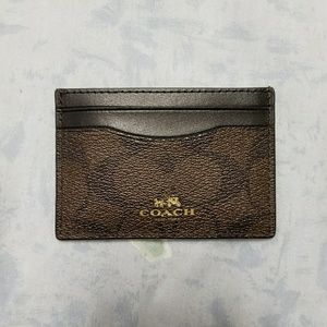 NWT Coach card case in brown signature.