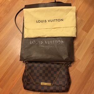 Louis Vuitton clutch/cross body