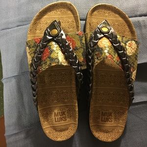 Muk Luks sandals .