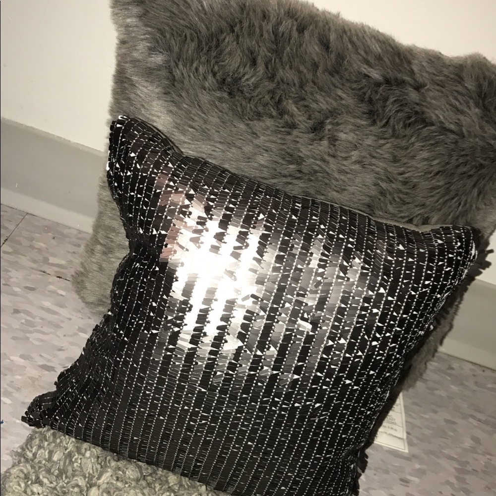 Brand new grey decorative pillows.