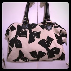 Carryon bag with bow design