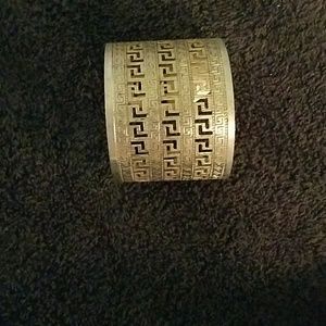 Brass cuff with Greek key detail