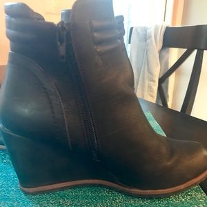 Black wedge ankle boots.