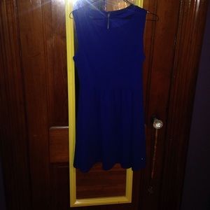 Cute mini royal blue dress with cutout back.