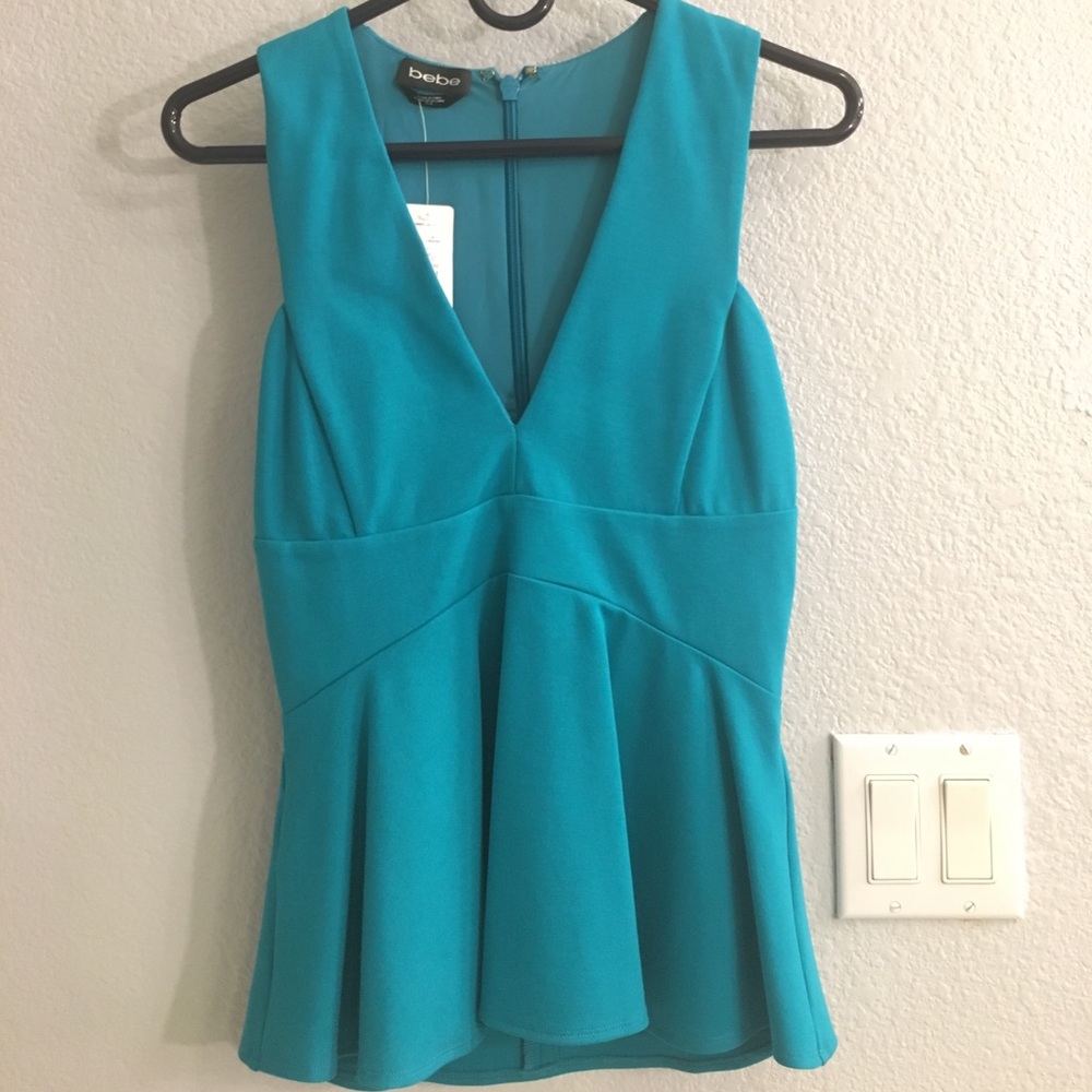 Bebe teal peplum top