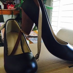 Black and brown pump