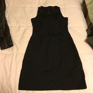 Black sleeveless dress with jeweled collar Black sleeveless dress with jeweled collar