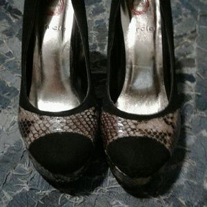 Black and snakeskin heels