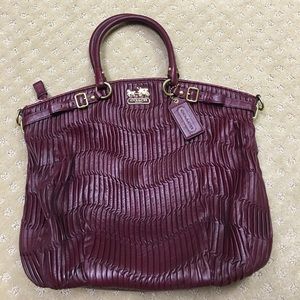 Coach satchel in burgundy wine color