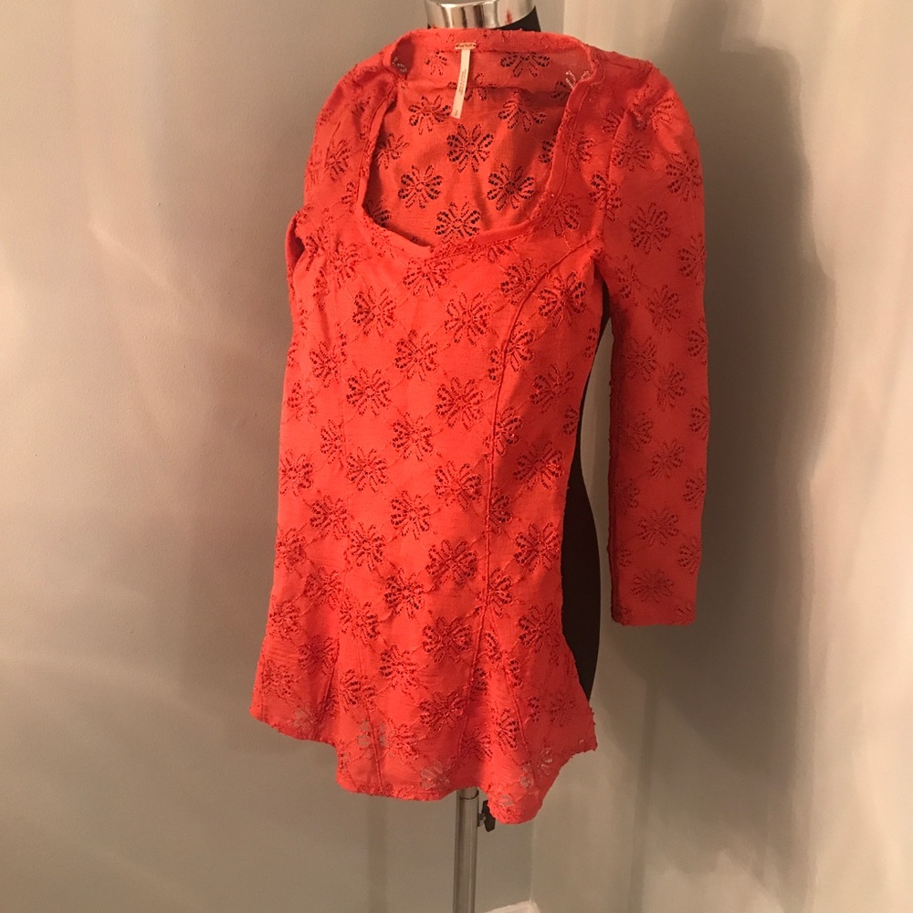 Coral peplum top from Free People