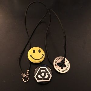 Happy face pin and butterfly necklace Happy face pin and butterfly necklace