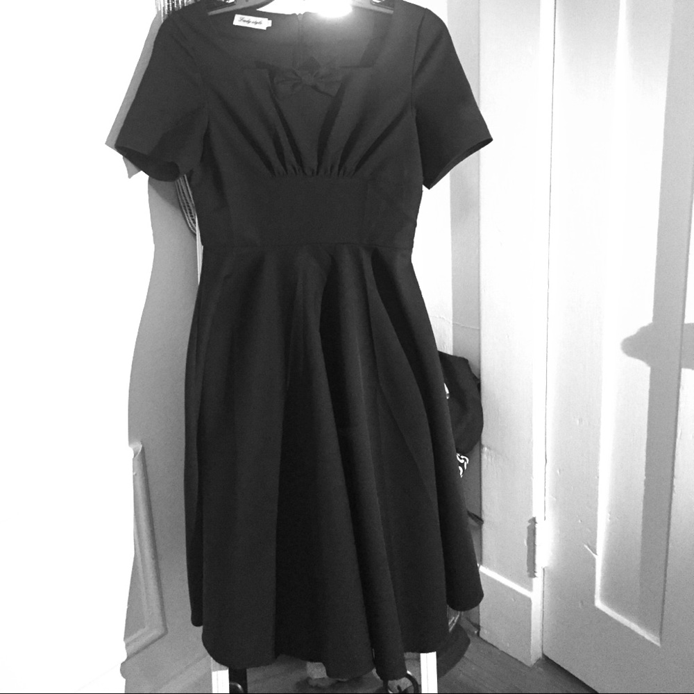 Black dress full skirt runs small