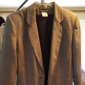 Long boyfriend jacket.  Button .missing