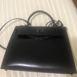 Black designer Kelly style So black bag.