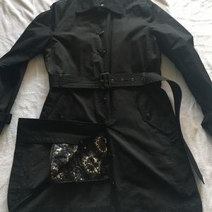 Trench coat with quilted detachable lining.