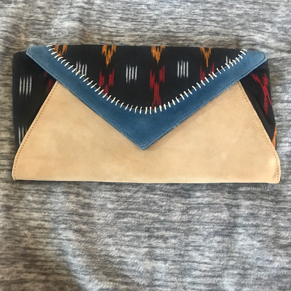 Great condition. Multicolor microsuede clutch