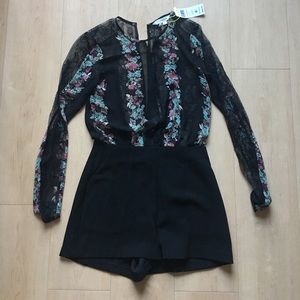 BCBGENERATION Floral and black open back romper