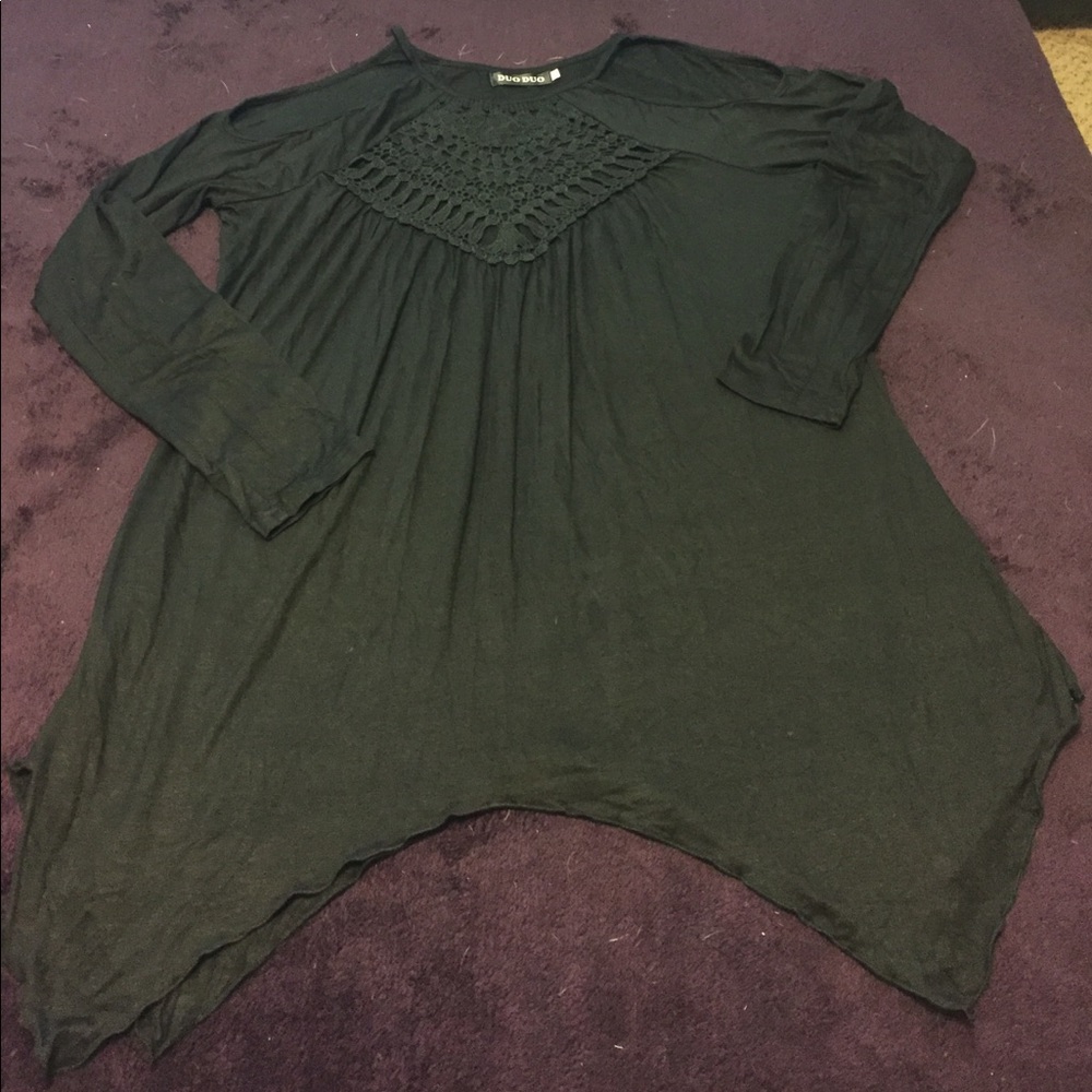 Blouse with peek-a-boo shoulders.