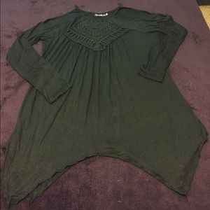 Blouse with peek-a-boo shoulders.