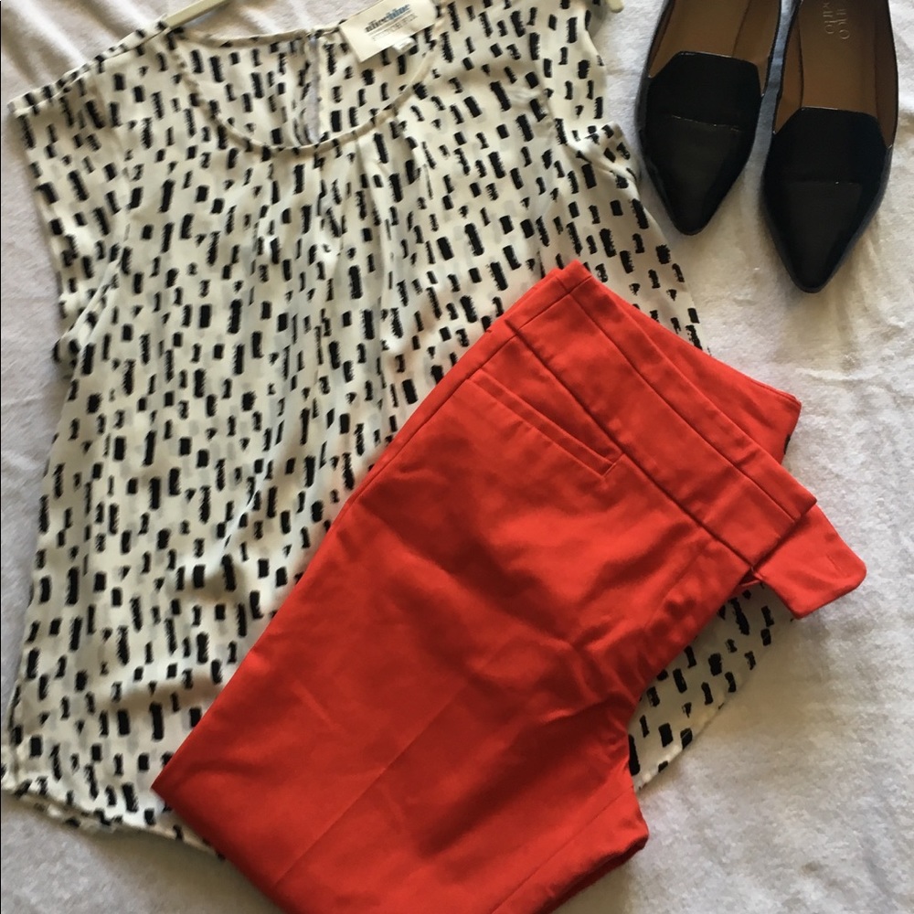 Red Marisa fit pants.