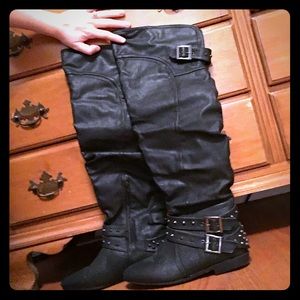 Tall studded boots