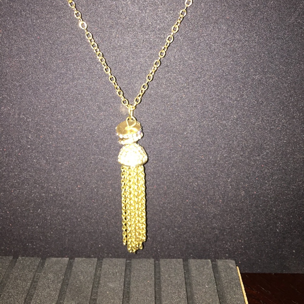 Long gold necklace