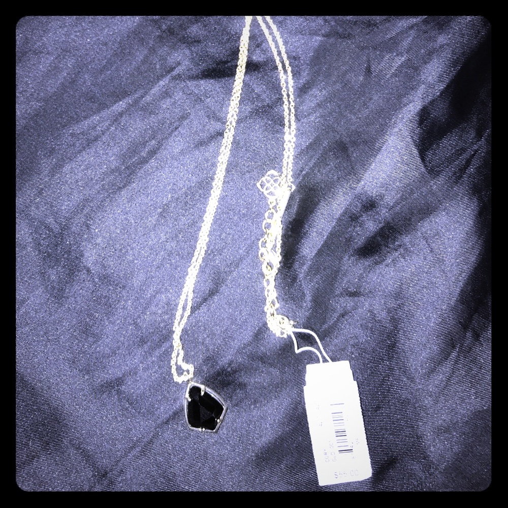 Black and gold Corey Kendra Scott necklace