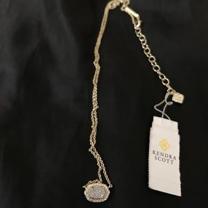 Kendra Scott Chelsea gold and iridescent jersey