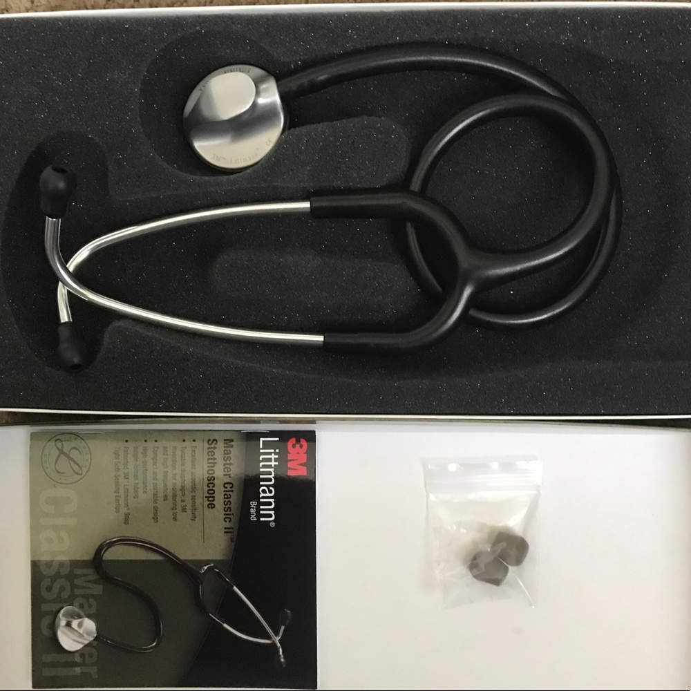 NP review book, stethoscope, proscope