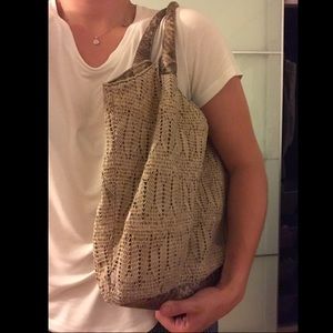 Cute woven presser with lining and leather straps Cute woven presser with lining and leather straps