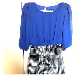 Blue, black and white dress with sleeve cutouts