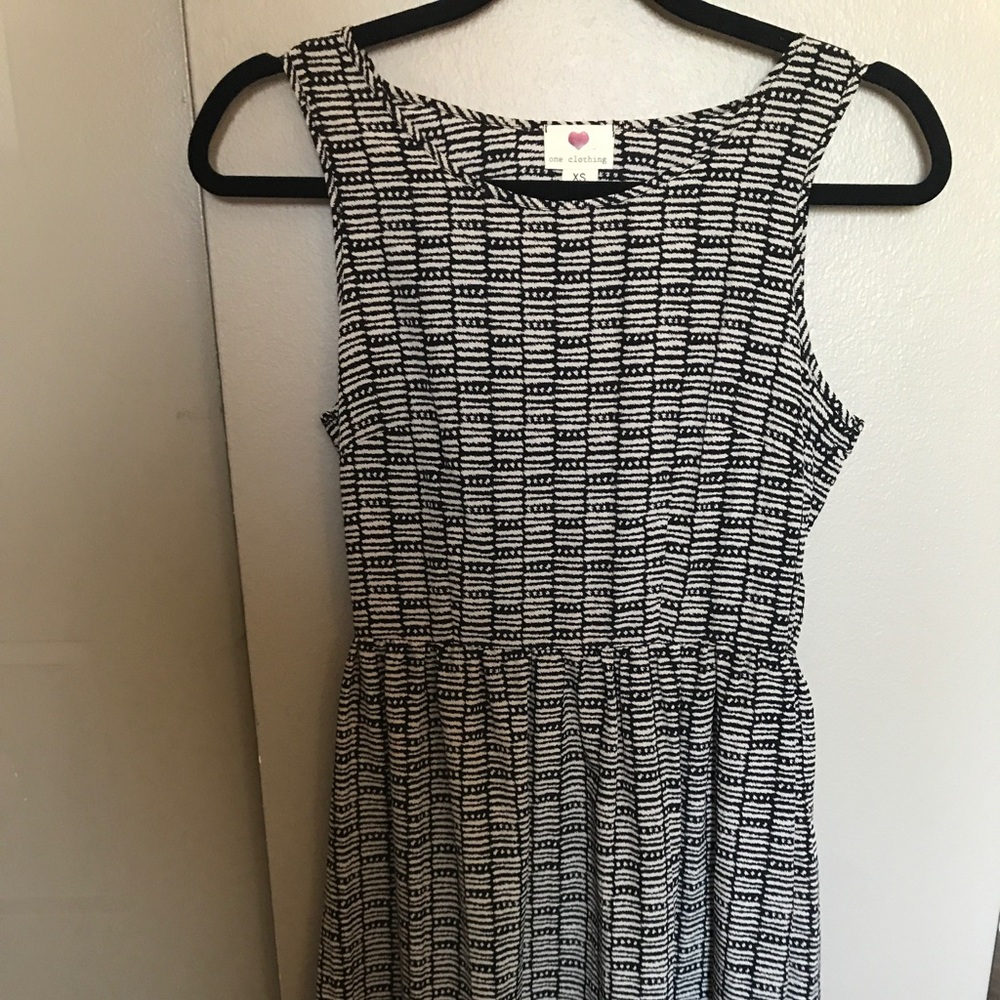 Cream and black sundress with back cutout
