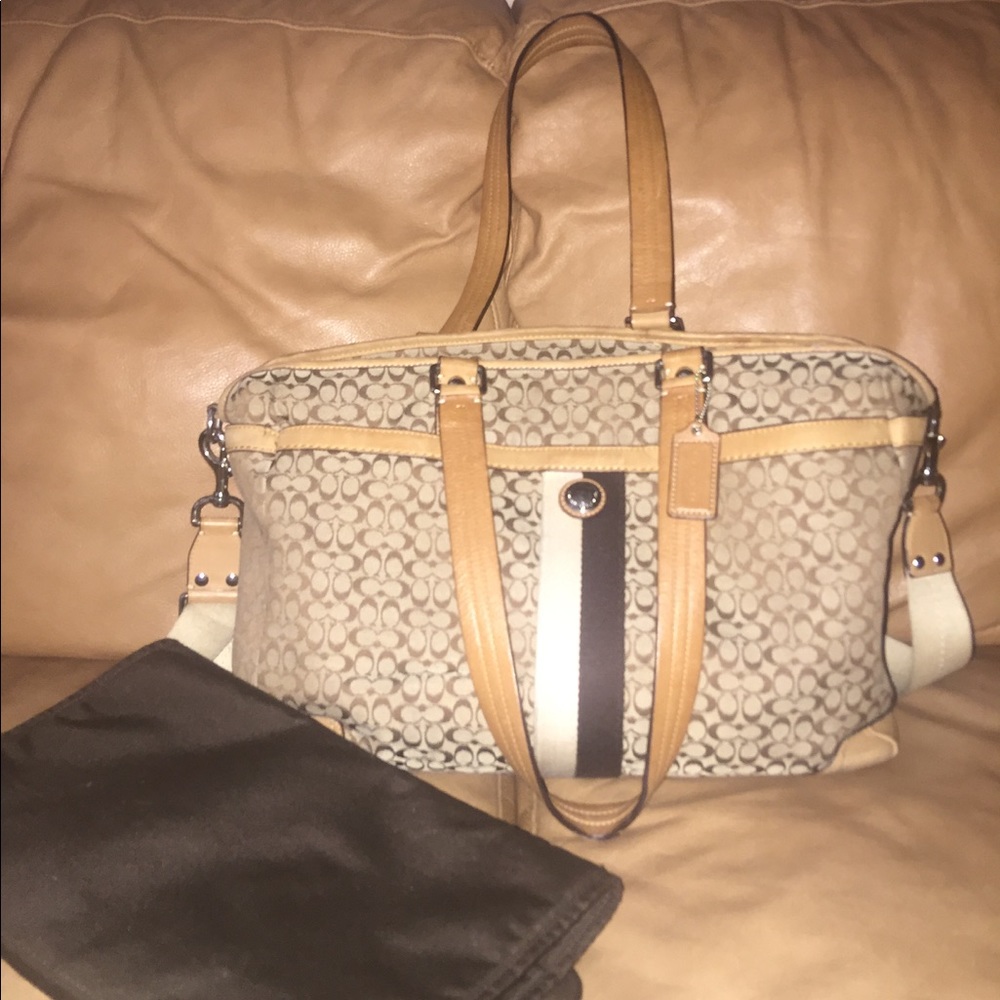 Coach diaper bag with changing pad. Very nice.