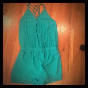 Naked Zebra vibrant teal romper