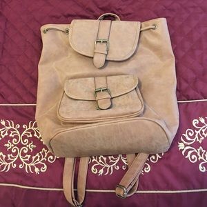 Tan leather backpack