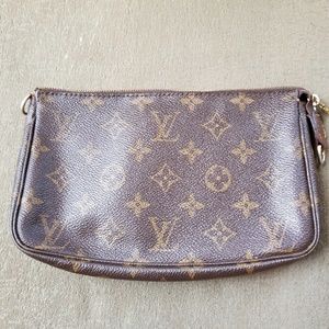 Louis Vuitton purse or makeup bag