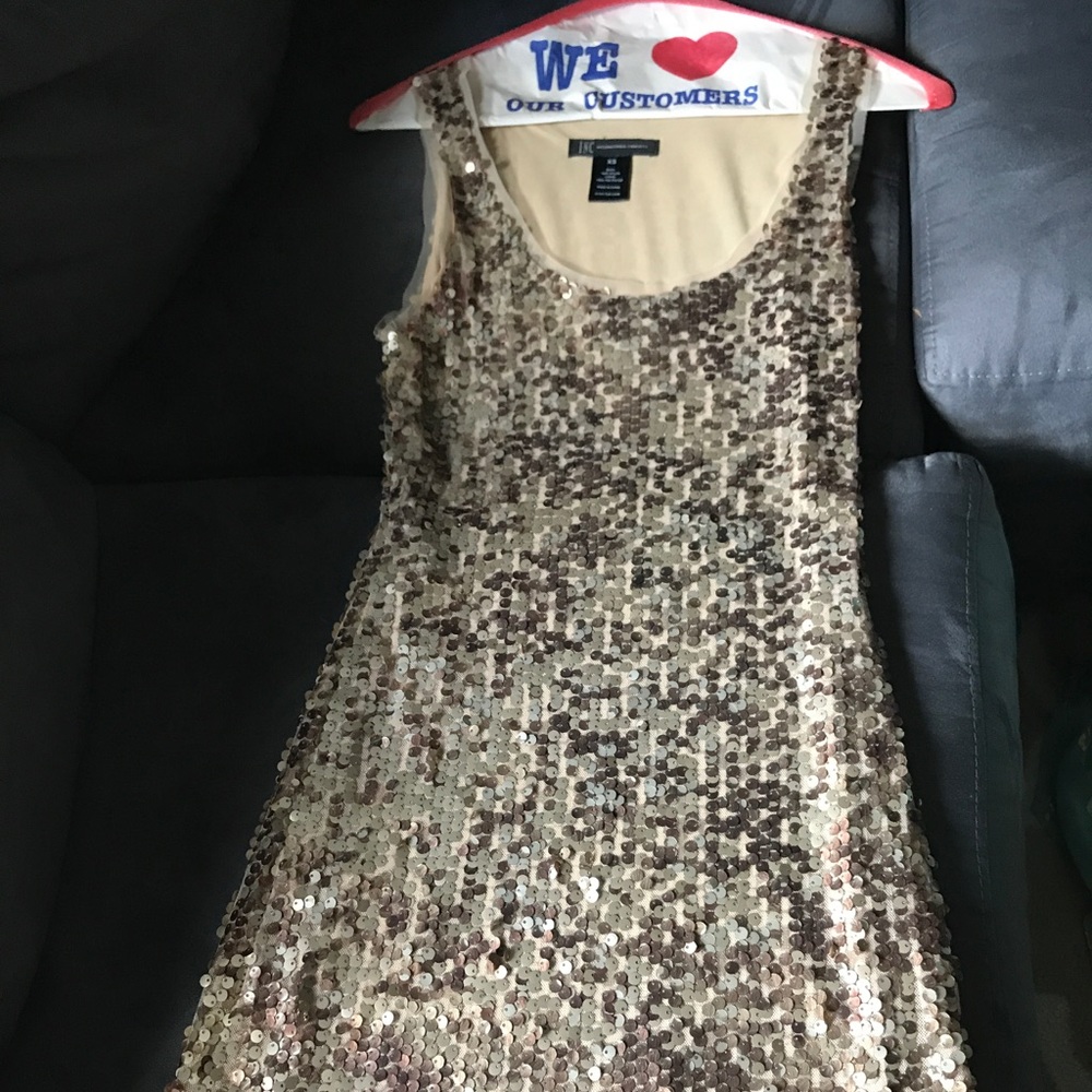 Fun, gold sequin dress.