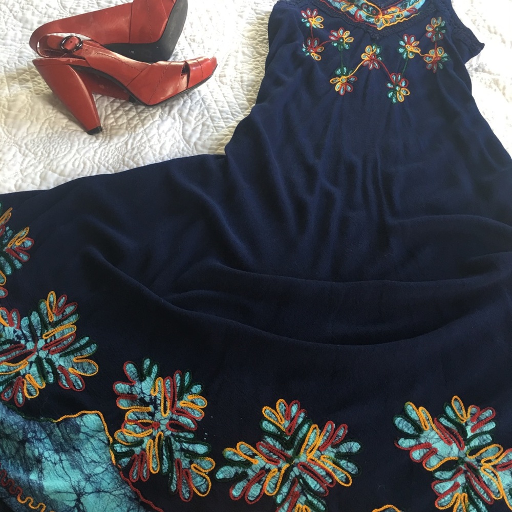 Colorfully embroidered dark blue dress.