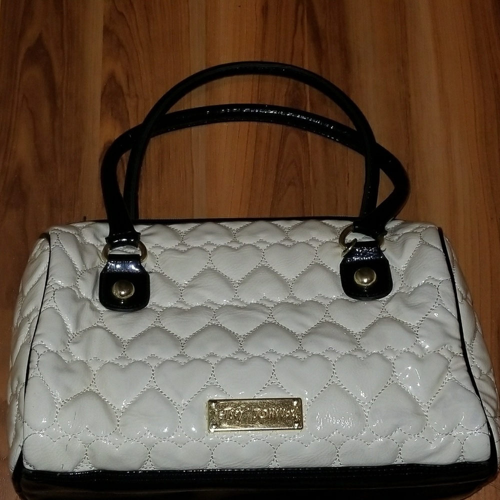 Ivory quilted heart bag by Betsey Johnson.