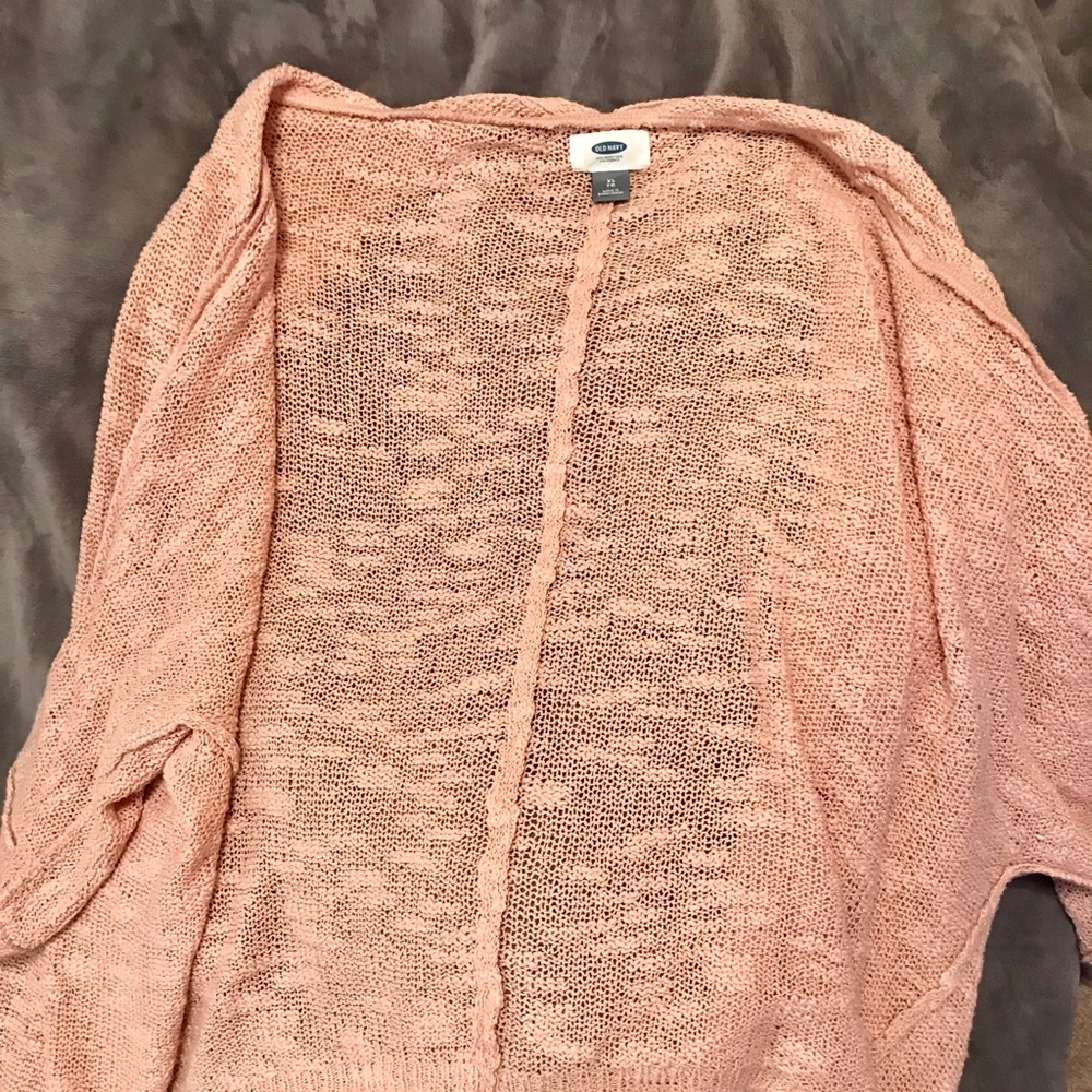 Pink oversized lightweight cardigan.