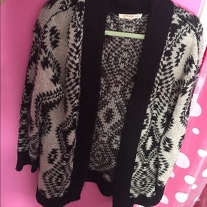 Warm, beige and black knitted cardigan