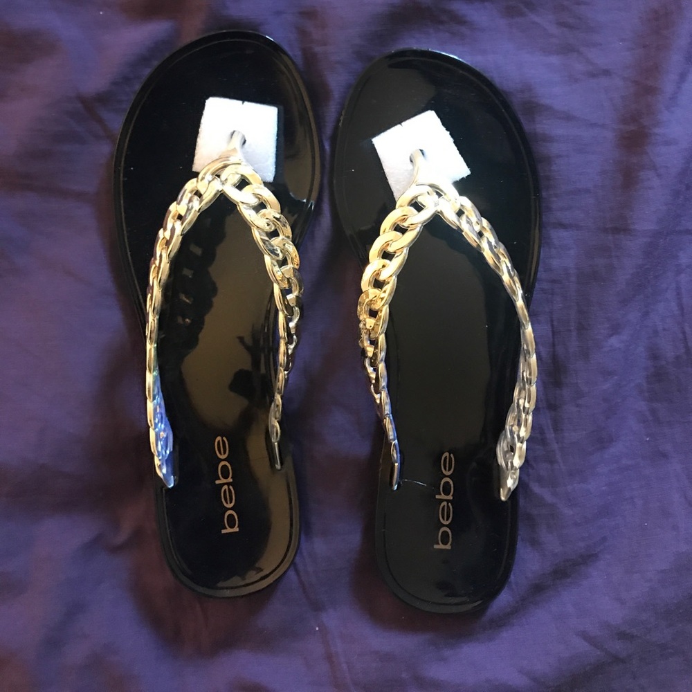 BEBE Gold chain flip flops. Size 6-7