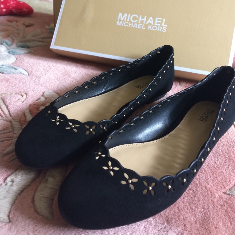Michael Kors flats.