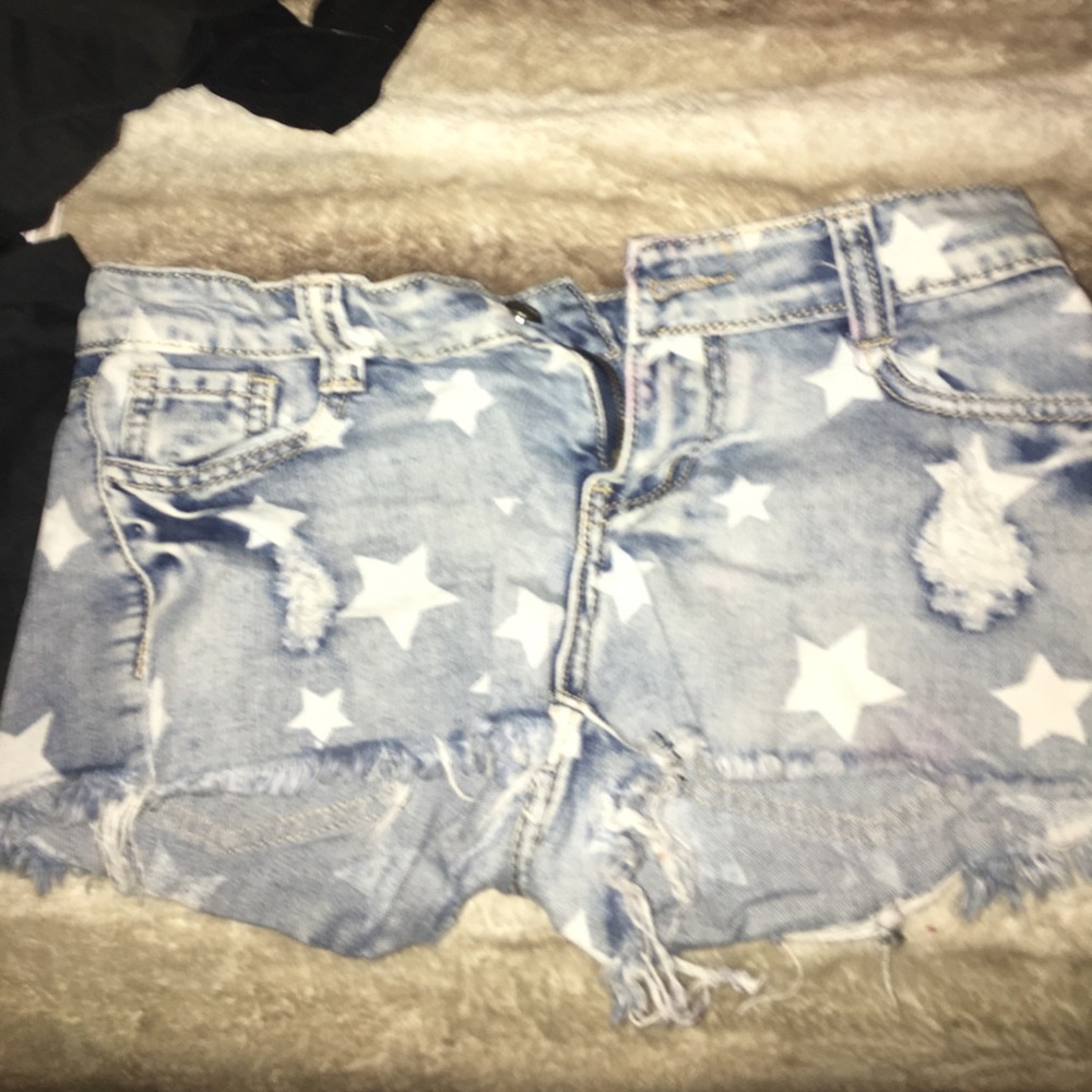 Stylish star ripped light blue jean shorts
