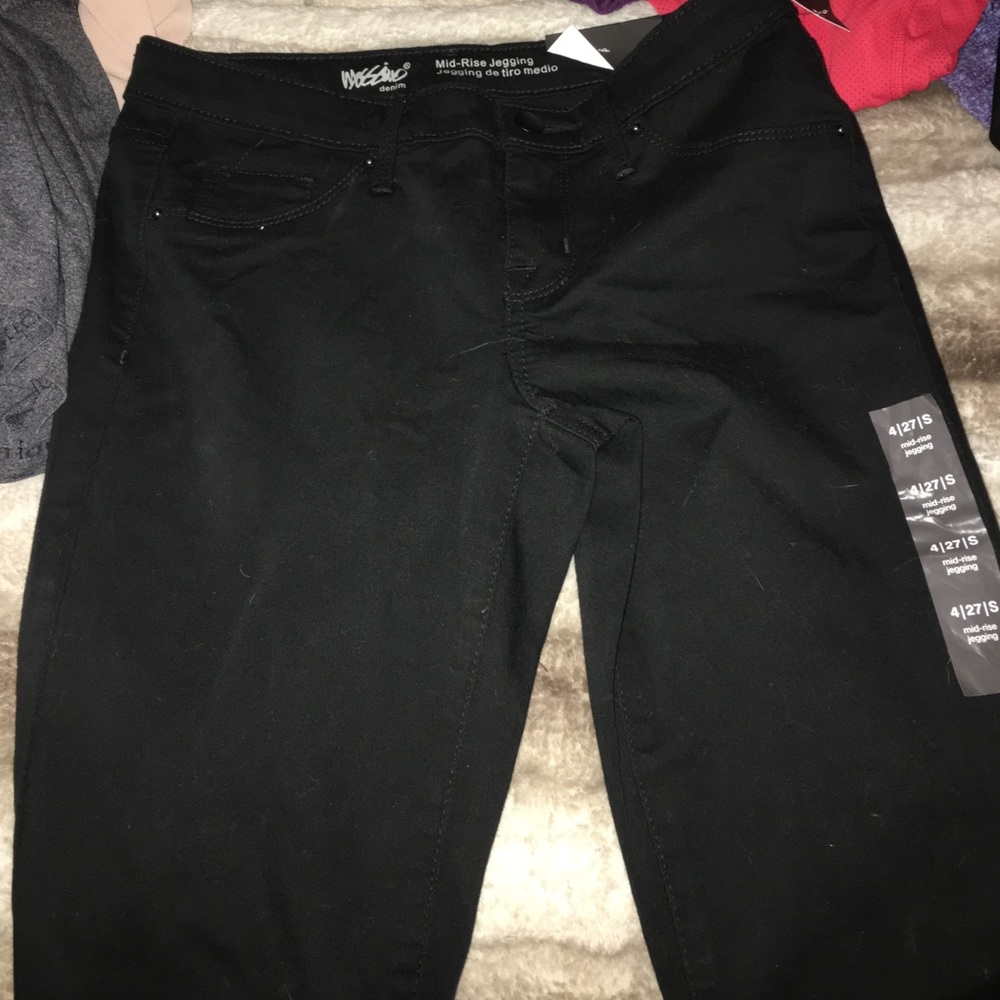 Mid rise black jegging brand new ( tags attached )