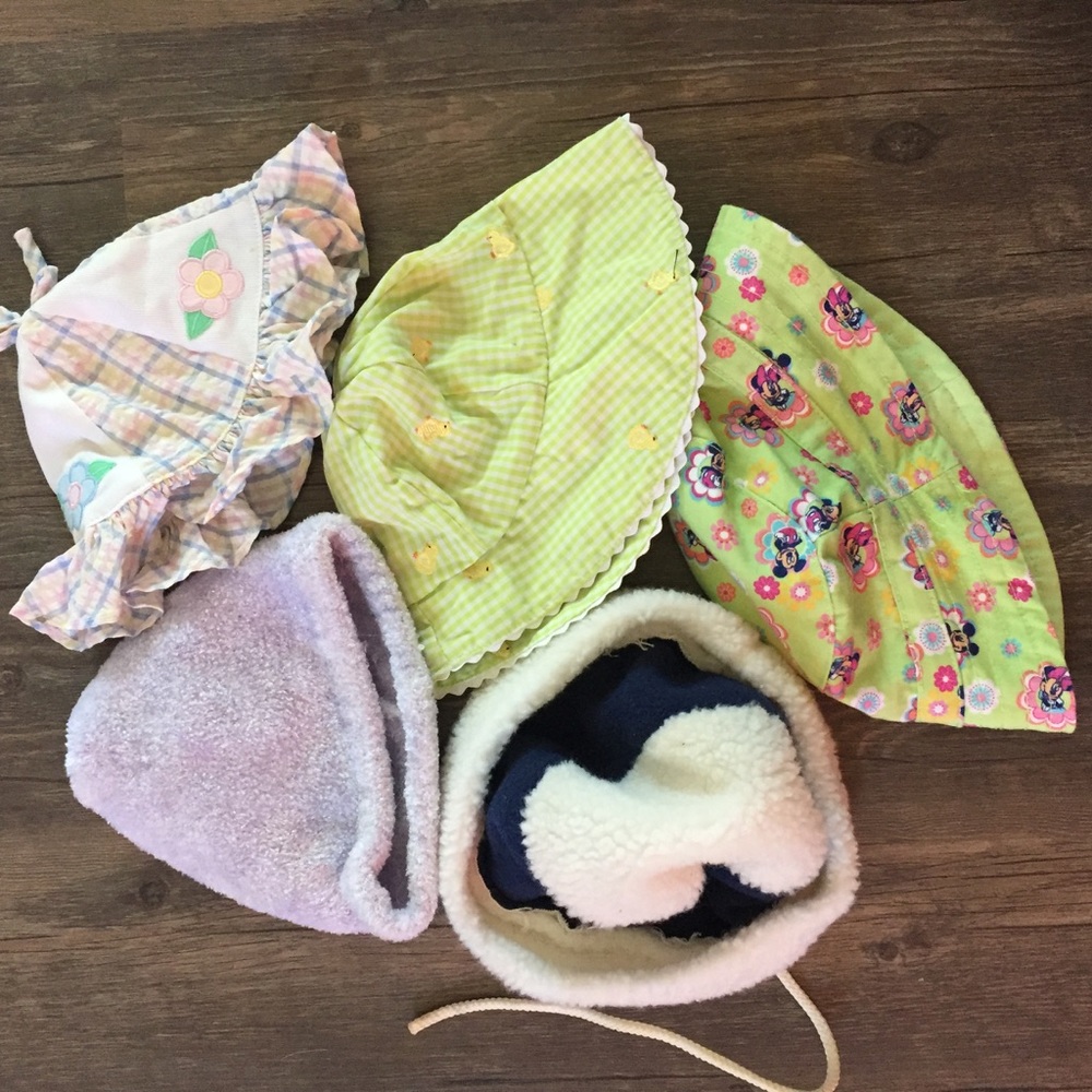Five newborn-toddler hats
