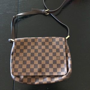 Authentic Louis Vuitton cross body messenger bag.