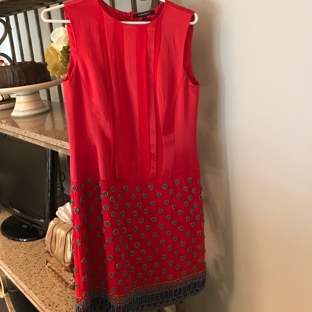 Red dress with blue beading details